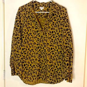 Cheetah print tunic with long sleeves and a non button V-neck